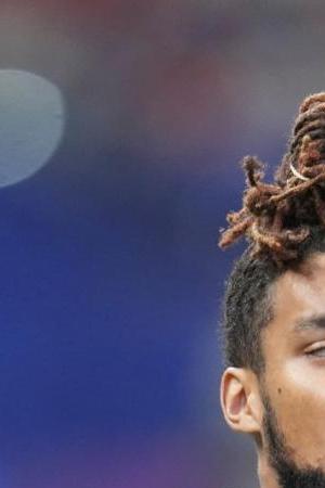 Miami running back Damien Martinez runs a drill at the NFL football scouting combine in Indianapolis, Saturday, March 1, 2025. (AP Photo/Michael Conroy)