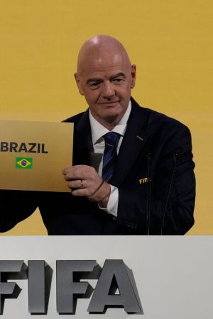 FIFA President Gianni Infantino announces that Brazil is chosen to host soccer's 2027 Women's World Cup at the FIFA Congress in Bangkok, Thailand, Friday, May 17, 2024.(AP Photo/Sakchai Lalit)