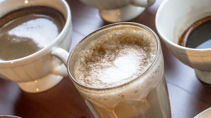 Table with multiple different kinds of coffees on it