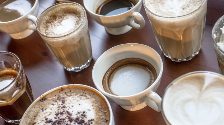 Table with multiple different kinds of coffees on it