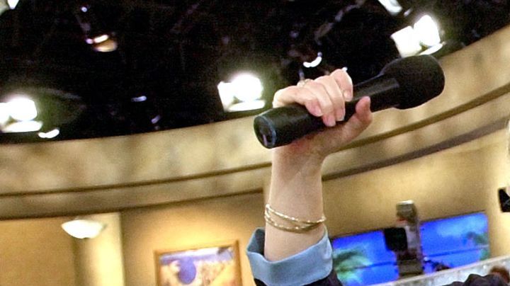 Latin media personality Cristina Saralegui poses for the cameras during a break from taping of her show Wednesday, Nov. 28, 2001, at the Blue Dolphin Studio in Miami. Saralegui next month will end her 12-year stint as host of the ``The Cristina Show,'' a weekly daytime program that draws an estimated 100 million viewers worldwide. (AP Photo/Tony Gutierrez)