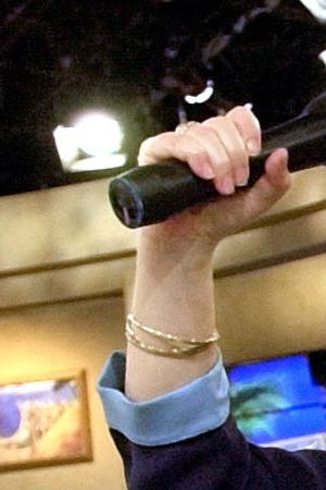 Latin media personality Cristina Saralegui poses for the cameras during a break from taping of her show Wednesday, Nov. 28, 2001, at the Blue Dolphin Studio in Miami. Saralegui next month will end her 12-year stint as host of the ``The Cristina Show,'' a weekly daytime program that draws an estimated 100 million viewers worldwide. (AP Photo/Tony Gutierrez)