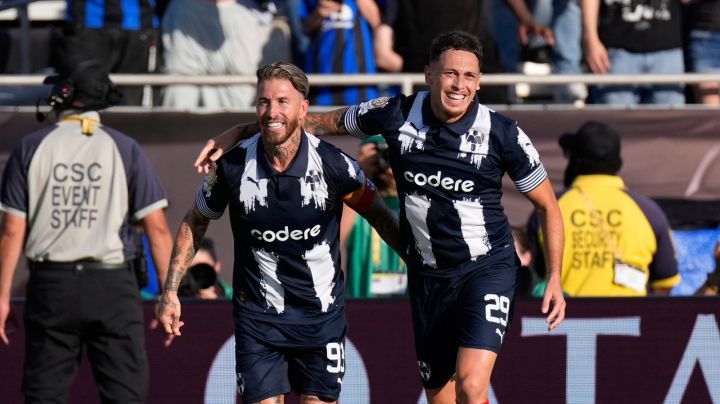 Monterrey's Sergio Ramos, center, celebrates scoring the opening goal with teammate Lucas Ocampos during the Club World Cup group E soccer match between CF Monterrey and Inter Milan in Pasadena, Calif., Tuesday, June 17, 2025. (AP Photo/Mark J. Terrill)