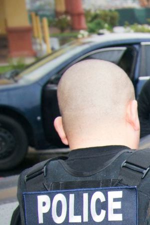 FILE - In this Tuesday, Feb. 7, 2017 photo released by U.S. Immigration and Customs Enforcement, foreign nationals are arrested during a targeted enforcement operation conducted by ICE aimed at immigration fugitives, re-entrants and at-large criminal aliens in Los Angeles. People arrested by deportation officers increasingly have no criminal backgrounds, according to figures released Friday, Feb. 23, 2018, reflecting the Trump administration's commitment to cast a wider net. (Charles Reed/U.S. Immigration and Customs Enforcement via AP)