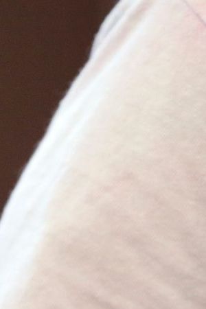 Title: Girl Scouts Girl Power Image ID: 18179438630860 Article: the vest of a Girl Scout is filled with badges and awards at a demonstration of some of their activities in Seattle on June 18, 2018. (AP Photo/Elaine Thompson)