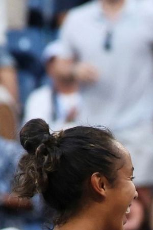 Leylah Fernandez, left, of Canada, and Venus Williams, of the United States, celebrate a win during a third-round doubles match of the U.S. Open tennis championships, Monday, Sept. 1, 2025, in New York. (AP Photo/Heather Khalifa)