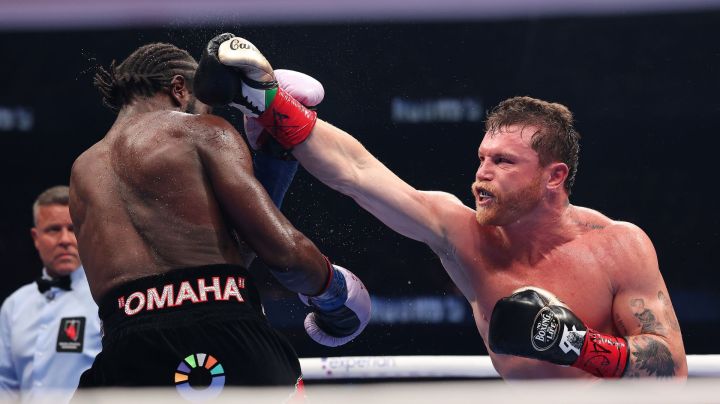 LAS VEGAS, NEVADA - SEPTEMBER 13: Canelo Alvarez throws a right punch at Terence Crawford in their undisputed super middleweight title fight during Netflix's Canelo v Crawford Fight Night at Allegiant Stadium on September 13, 2025 in Las Vegas, Nevada. (Photo by Sarah Stier/Getty Images for Netflix)