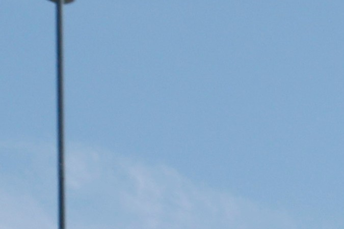 Daniel Suarez, left, gives autographs before a NASCAR Cup Series auto race at Kansas Speedway in Kansas City, Kan., Sunday, May 11, 2025. (AP Photo/Colin E. Braley)