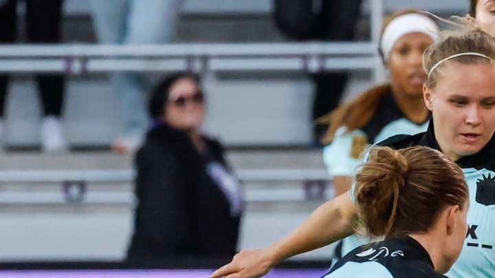 Orlando Pride forward Marta Marta, right, brings the ball down the pitch against NJ/NY Gotham FC defender Emily Sonnett (6), midfielder Josefine Hasbo, center, and defender Kayla Duran (19) during the second half of an NWSL women's semifinal soccer match, Sunday, Nov. 16, 2025, in Orlando, Fla. (AP Photo/Kevin Kolczynski)