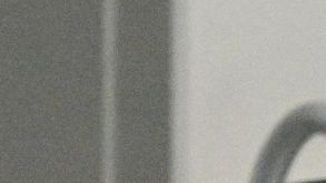 A spectator holds a Mexican flag during the second half of an NFL football game between the Dallas Cowboys and the New Orleans Saints, Sunday, Sept. 15, 2024, in Arlington, Texas. (AP Photo/Jerome Miron)