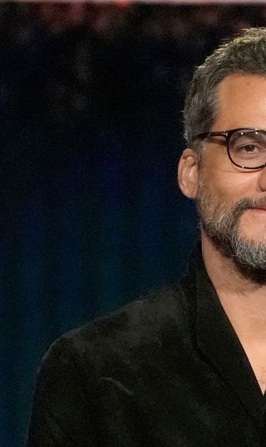 Wagner Moura, left, and Kleber Mendonça Filho present the award for best picture during the 31st Annual Critics Choice Awards on Sunday, Jan. 4, 2026, at The Barker Hanger in Santa Monica, Calif. (AP Photo/Chris Pizzello)