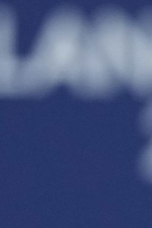 Gold medalist Alysa Liu of the United States displays her medal after competing in the women's free skate program in figure skating at the 2026 Winter Olympics, in Milan, Italy, Thursday, Feb. 19, 2026. (AP Photo/Stephanie Scarbrough)