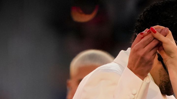 Bad Bunny and Lady Gaga perform during halftime of the NFL Super Bowl 60 football game between the New England Patriots and the Seattle Seahawks, Sunday, Feb. 8, 2026, in Santa Clara, Calif. (AP Photo/Brynn Anderson)