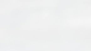 Regina Martinez Lorenzo, of Mexico, center, the last athlete to cross the finish line, is embraced by Bruna Moura, of Brazil, center left, and Jessie Diggins, of the United States, while silver medalist Ebba Andersson, of Sweden, left, and gold medalist Frida Karlsson, of Sweden, right, look on, at the end of the cross country skiing women's 10km interval start free at the 2026 Winter Olympics, in Tesero, Italy, Thursday, Feb. 12, 2026. (AP Photo/Matthias Schrader)