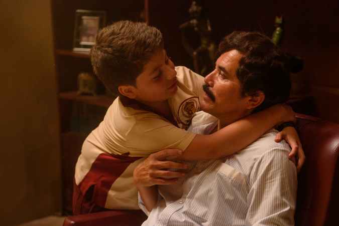 DEAR KILLER NANNIES – “Dear Killer Nannies” is a gripping coming-of-age series told through Juampi’s perspective as a child, the son of Colombia’s most notorious drug lord, Pablo Escobar Gaviria. As he grows up, Juampi’s world begins to fracture, shaped by his father’s expanding criminal empire and the constant presence of danger — embodied by the hitmen who serve as his “nannies.” Featuring a stellar cast including John Leguizamo as Pablo Escobar Gaviria, the series explores loyalty, fear, and the loss of innocence, revealing the human cost of a childhood spent inside one of history’s most infamous criminal legacies. (Courtesy of Disney)
MIGUEL TAMAYO, JOHN LEGUIZAMO